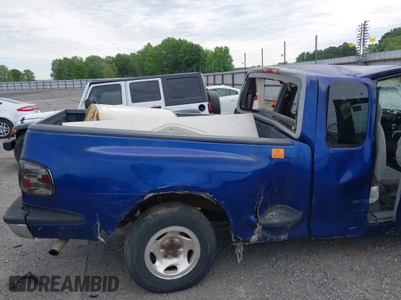 1998 Ford F-150 XL with VIN 2FTZX0722WCA65198, listed as a IAAI auction lot 42145451 with 188,529 mi miles and . Bid and sale history available at DreamBid. Image 13.