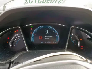 2016 Honda Civic EX-T z VIN 19XFC1F37GE012186, wystawiony jako Copart lot #51590575 z przebiegiem 121 041 mil mil oraz Szkoda całkowita • Salvage title. Historia ofert i sprzedaży dostępna na DreamBid. Obrazek 9.