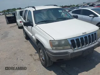 2003 Jeep Grand Cherokee Laredo with VIN 1J4GX48S63C546208, listed as a IAAI auction lot 42288811 with 141,696 mi miles and . Bid and sale history available at DreamBid. Image 1.