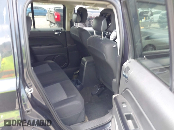 2014 Jeep Patriot Latitude with VIN 1C4NJPFA4ED604145, listed as a IAAI auction lot 42091619 with 81,119 mi miles and . Bid and sale history available at carsss.com. Image 8.