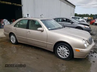 2001 Mercedes-Benz E-Class with VIN WDBJF65J01B389296, listed as a Copart auction lot 71933404 with 124,392 mi miles and Salvage Title. Bid and sale history available at carsss.com. Image 4.
