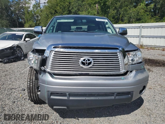 2012 Toyota Tundra 4WD Truck LTD with VIN 5TFHY5F15CX238124, listed as a Copart auction lot 69297994 with 165,591 mi miles and Salvage Title. Bid and sale history available at carsss.com. Image 5.