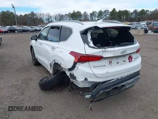 2020 Hyundai Santa Fe Limited with VIN 5NMS5CAA7LH148833, listed as a IAAI auction lot 41250252 with 59,429 mi miles. Bid and sale history available at carsss.com. Image 3.