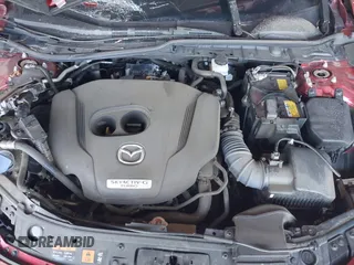 2021 Mazda 3 Premium Plus z VIN JM1BPBNY3M1332643, wystawiony jako IAAI lot #41536777 z przebiegiem 43 075 mil mil oraz . Historia ofert i sprzedaży dostępna na DreamBid. Obrazek 10.