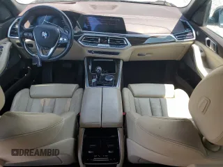 2019 BMW X5 xDrive40i with VIN 5UXCR6C5XKLL61071, listed as a Copart auction lot 60158945 with 67,631 mi miles and Salvage title. Bid and sale history available at DreamBid. Image 8.