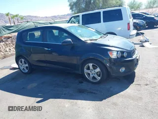 2015 Chevrolet Sonic LTZ with VIN 1G1JE6SB8F4116693, listed as a IAAI auction lot 42865997 with 102,961 mi miles and . Bid and sale history available at DreamBid. Image 12.