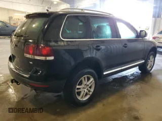 2009 Volkswagen Touareg VR6 z VIN WVGBE77L29D015958, wystawiony jako Copart lot #52019505 z przebiegiem 179 339 mil mil oraz Czysty tytuł • Clean title. Historia ofert i sprzedaży dostępna na DreamBid. Obrazek 3.