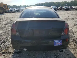 2002 Nissan Altima SE z VIN 1N4BL11D52C257427, wystawiony jako Copart lot #56577585 z przebiegiem 364 788 mil mil oraz Szkoda całkowita • Salvage title. Historia ofert i sprzedaży dostępna na DreamBid. Obrazek 6.