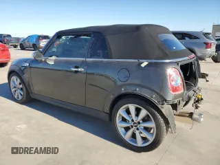 2014 MINI Convertible S with VIN WMWZP3C58ET706941, listed as a Copart auction lot 81900674 with 61,292 mi miles and Salvage title. Bid and sale history available at DreamBid. Image 2.