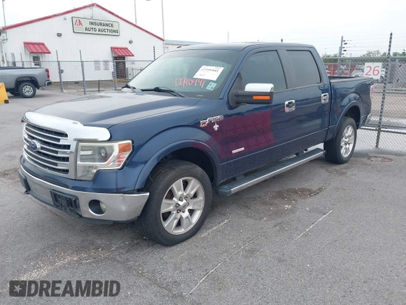 2013 Ford F-150 XL with VIN 1FTFW1ETXDKF51063, listed as a IAAI auction lot 42790441 with 303,665 mi miles and . Bid and sale history available at DreamBid. Image 17.