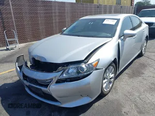 2013 Lexus ES 300h with VIN JTHBW1GG2D2022140, listed as a IAAI auction lot 42677307 with 133,630 mi miles and . Bid and sale history available at DreamBid. Image 2.