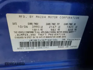 2007 Mazda 3 S Touring z VIN JM1BK343671661304, wystawiony jako Copart lot #52593745 z przebiegiem 119 342 mil mil oraz Szkoda całkowita • Salvage title. Historia ofert i sprzedaży dostępna na DreamBid. Obrazek 13.