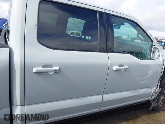 2023 Ford F-150 Lightning Pro with VIN 1FTVW1EV3PWG60491, listed as a IAAI auction lot 41507485 with 19,148 mi miles and . Bid and sale history available at DreamBid. Image 14.
