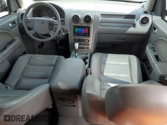 2005 Ford Freestyle SEL z VIN 1FMDK021X5GA25385, wystawiony jako Copart lot #72239954 z przebiegiem 161 219 mil mil oraz Szkoda całkowita • Salvage title. Historia ofert i sprzedaży dostępna na DreamBid. Obrazek 8.