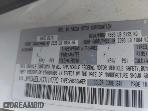 2012 Mazda 5 Sport with VIN JM1CW2BLXC0114770, listed as a IAAI auction lot 42147656 with 99,908 mi miles and . Bid and sale history available at DreamBid. Image 9.