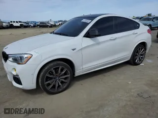 2018 BMW X4 M40i with VIN 5UXXW7C57J0W63952, listed as a Copart auction lot 47435363 with 67,198 mi miles. Bid and sale history available at carsss.com. Image 1.
