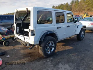 2020 Jeep Wrangler Unlimited Sahara with VIN 1C4HJXENXLW220910, listed as a IAAI auction lot 41090420 with 88,895 mi miles and . Bid and sale history available at DreamBid. Image 4.