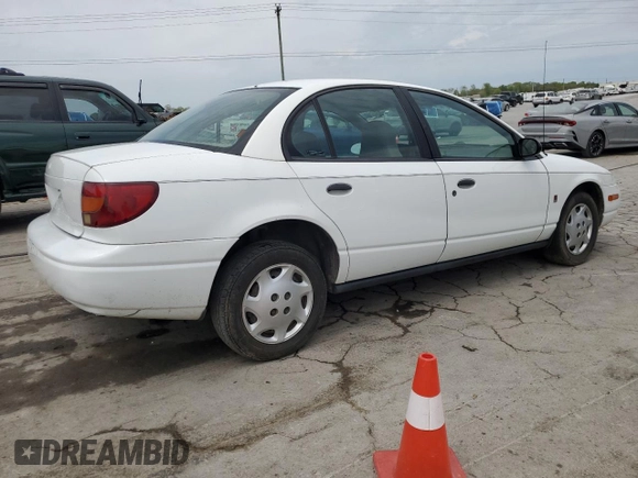 2002 Saturn SL z VIN 1G8ZH52842Z136222, wystawiony jako Copart lot #53687125 z przebiegiem 133 327 mil mil oraz Szkoda całkowita • Salvage title. Historia ofert i sprzedaży dostępna na DreamBid. Obrazek 3.