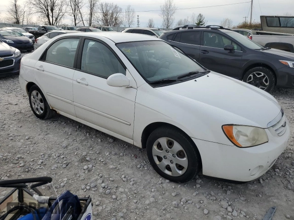2006 Kia Spectra EX with VIN KNAFE121265208526, listed as a Copart auction lot 80300604 with 101,780 mi miles and Salvage Title. Bid and sale history available at carsss.com. Image 4.