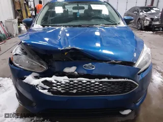 2018 Ford Focus SE with VIN 1FADP3F26JL312725, listed as a IAAI auction lot 41488559 with 30,686 mi miles. Bid and sale history available at carsss.com. Image 12.