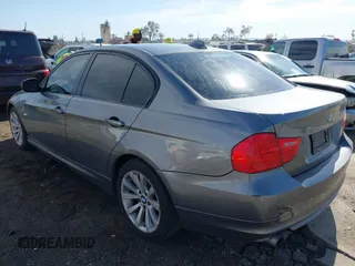 2011 BMW 3 Series 328i with VIN WBAPH5G55BNM71702, listed as a IAAI auction lot 42013598 with 192,744 mi miles. Bid and sale history available at carsss.com. Image 3.