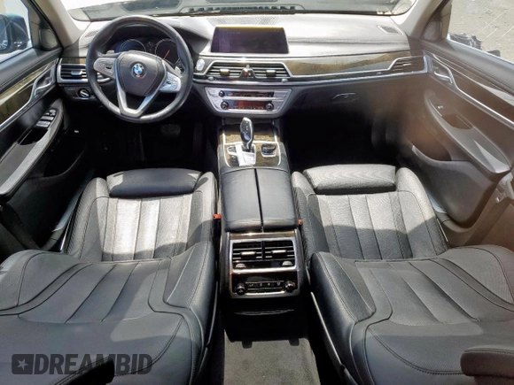 2016 BMW 7 Series 740i with VIN WBA7E2C57GG714564, listed as a Copart auction lot 64005965 with 111,598 mi miles and Salvage title. Bid and sale history available at DreamBid. Image 8.