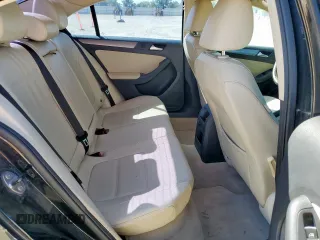 2013 Volkswagen Jetta TDI w/Premium z VIN 3VWLL7AJ7DM232096, wystawiony jako Copart lot #57265725 z przebiegiem 120 361 mil mil oraz Szkoda całkowita • Salvage title. Historia ofert i sprzedaży dostępna na DreamBid. Obrazek 10.