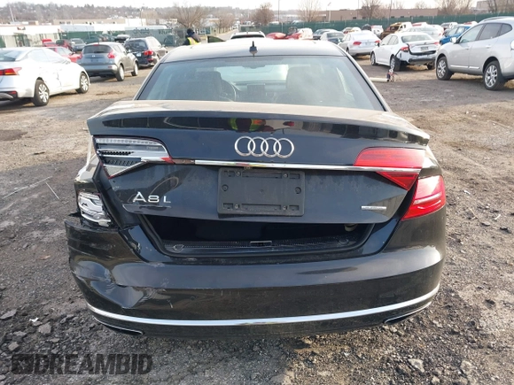 2015 Audi A8 3.0T with VIN WAU3GAFDXFN028244, listed as a IAAI auction lot 41791578 with 149,770 mi miles and . Bid and sale history available at DreamBid. Image 16.