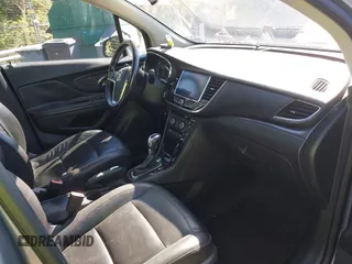 2019 Buick Encore Essence with VIN KL4CJGSM5KB869925, listed as a IAAI auction lot 41937487 with 105,702 mi miles. Bid and sale history available at carsss.com. Image 5.