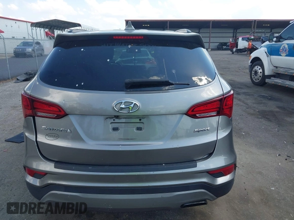 2017 Hyundai Santa Fe 2.4L z VIN 5NMZU3LB7HH025791, wystawiony jako IAAI lot #42277964 z przebiegiem 154 110 mil mil oraz . Historia ofert i sprzedaży dostępna na DreamBid. Obrazek 16.