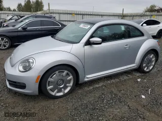 2012 Volkswagen Beetle 2.5L w/Sun PZEV with VIN 3VWJP7AT6CM630282, listed as a Copart auction lot 71096824 with 85,312 mi miles and Clean Title. Bid and sale history available at carsss.com. Image 1.