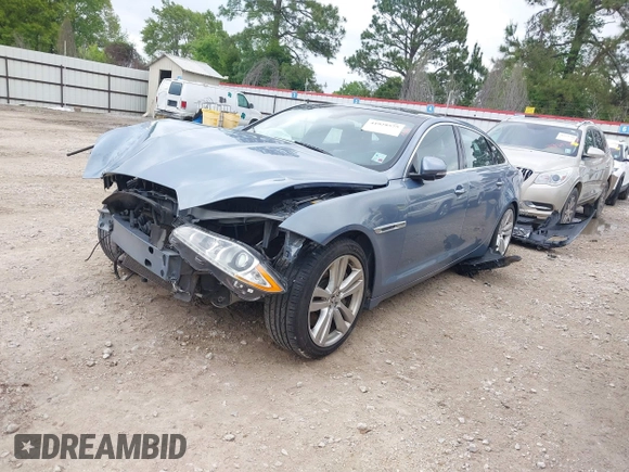 2013 Jaguar XJ with VIN SAJWA2G17DLV57561, listed as a IAAI auction lot 41928575 with 108,794 mi miles. Bid and sale history available at carsss.com. Image 2.