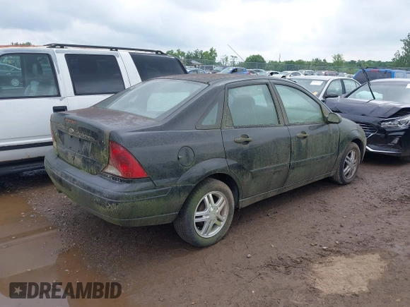 2004 Ford Focus SE with VIN 1FAFP34394W114485, listed as a IAAI auction lot 42737378 with 104,817 mi miles and . Bid and sale history available at DreamBid. Image 4.