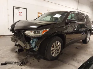2018 Chevrolet Traverse LT Cloth z VIN 1GNEVGKW2JJ232734, wystawiony jako IAAI lot #41931040 z przebiegiem 91 580 mil mil oraz . Historia ofert i sprzedaży dostępna na DreamBid. Obrazek 2.