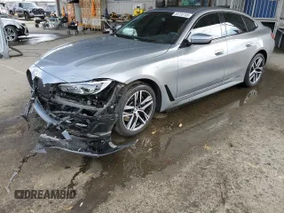 2022 BMW 4 Series 430i with VIN WBA63AV00NFM69588, listed as a Copart auction lot 50720105 with 22,047 mi miles and Salvage title. Bid and sale history available at DreamBid. Image 1.