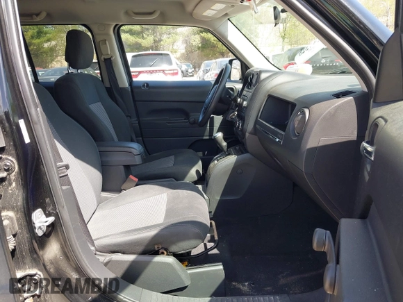 2012 Jeep Patriot Sport with VIN 1C4NJRBB3CD599477, listed as a IAAI auction lot 42147528 with 144,269 mi miles. Bid and sale history available at carsss.com. Image 5.