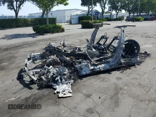 2022 Tesla Model S с VIN 5YJSA1E57NF491563, выставлен на аукционе Copart как лот 59216935 с пробегом Не указан миль и На запчасти • Non repairable. История ставок и продаж доступна на DreamBid. Изображение 1.