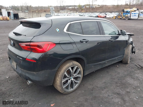 2019 BMW X2 xDrive28i with VIN WBXYJ5C50K5N03198, listed as a IAAI auction lot 41999528 with 28,949 mi miles. Bid and sale history available at carsss.com. Image 4.