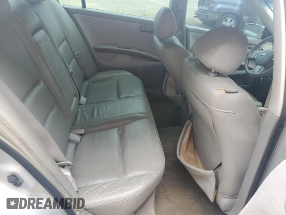 2004 Nissan Maxima SL with VIN 1N4BA41EX4C869772, listed as a Copart auction lot 69843554 with 205,409 mi miles and Salvage Title. Bid and sale history available at carsss.com. Image 10.