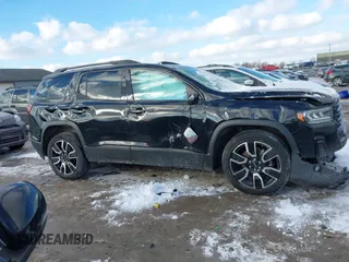 2021 GMC Acadia SLT z VIN 1GKKNULS4MZ179132, wystawiony jako IAAI lot #41349544 z przebiegiem 77 662 mil mil oraz . Historia ofert i sprzedaży dostępna na DreamBid. Obrazek 12.