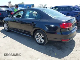 2013 Volkswagen Jetta Hybrid SE with VIN 3VW637AJ8DM299657, listed as a IAAI auction lot 42538101 with 128,822 mi miles and . Bid and sale history available at DreamBid. Image 3.