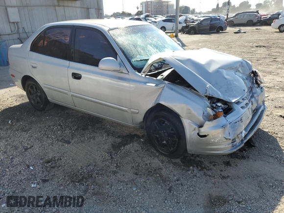 2004 Hyundai Accent GL with VIN KMHCG45C74U550647, listed as a Copart auction lot 74526474 with 115,838 mi miles and Salvage Title. Bid and sale history available at carsss.com. Image 4.