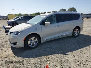 2019 Chrysler Pacifica Hybrid Touring L with VIN 2C4RC1L73KR640189, listed as a Copart auction lot 60964265 with 79,965 mi miles and Salvage title. Bid and sale history available at DreamBid. Image 1.