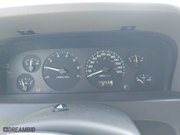 2004 Jeep Grand Cherokee Laredo with VIN 1J4GX48S14C259215, listed as a IAAI auction lot 41906121 with 142,668 mi miles. Bid and sale history available at carsss.com. Image 7.