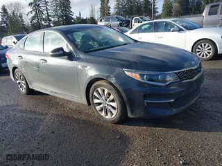 2016 Kia Optima EX with VIN 5XXGU4L33GG010286, listed as a IAAI auction lot 41669758 with 111,713 mi miles. Bid and sale history available at carsss.com. Image 1.