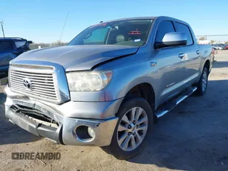 2012 Toyota Tundra 4WD Truck LTD with VIN 5TFHW5F18CX251584, listed as a IAAI auction lot 41054238 with 124,892 mi miles. Bid and sale history available at carsss.com. Image 2.