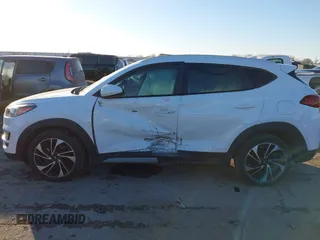 2019 Hyundai Tucson Sport with VIN KM8J33AL1KU838499, listed as a IAAI auction lot 41317832 with 71,594 mi miles. Bid and sale history available at carsss.com. Image 6.