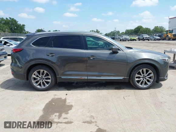 2016 Mazda CX-9 Signature with VIN JM3TCBEY9G0100579, listed as a IAAI auction lot 42282293 with 142,700 mi miles and . Bid and sale history available at DreamBid. Image 13.