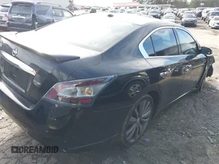 2014 Nissan Maxima S with VIN 1N4AA5AP0EC909054, listed as a IAAI auction lot 41581084 with 68,667 mi miles and . Bid and sale history available at DreamBid. Image 4.