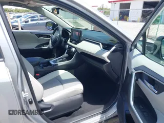 2021 Toyota RAV4 Hybrid LE with VIN 2T3B6RFV2MW018967, listed as a IAAI auction lot 42601989 with 71,046 mi miles and . Bid and sale history available at DreamBid. Image 5.